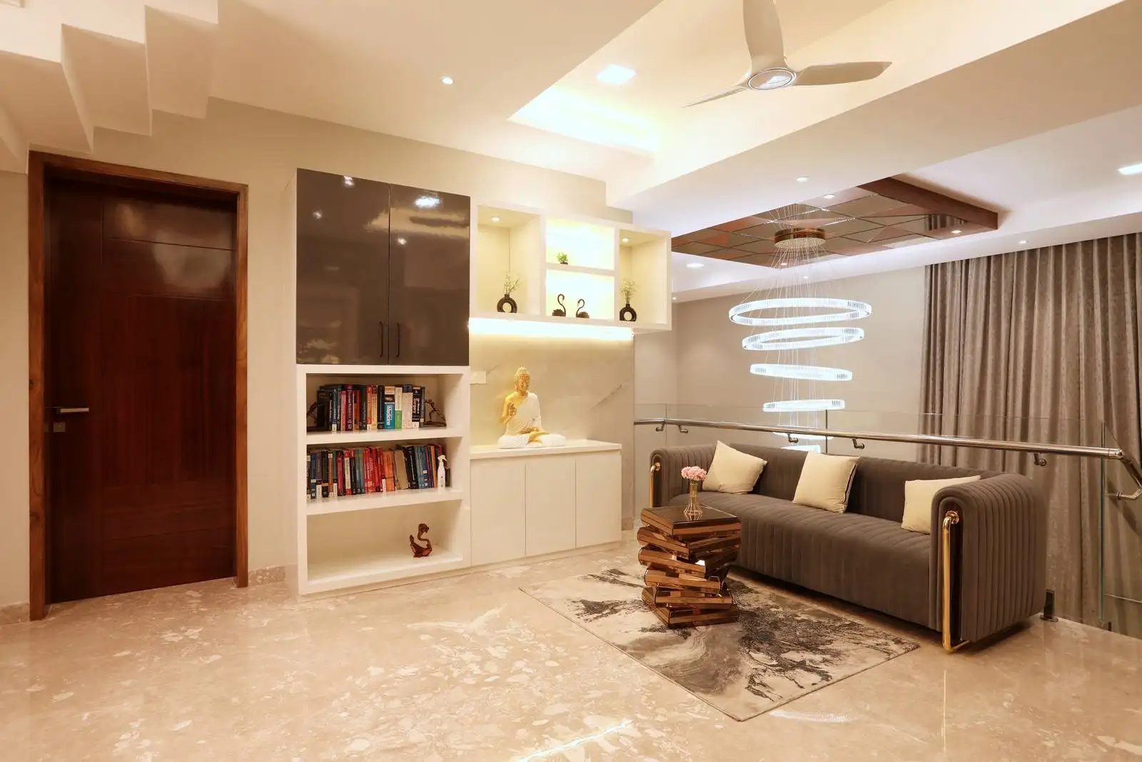 Built-in study unit with minimalist desk, sleek cabinetry, and contrasting finishes for a refined, functional workspace.