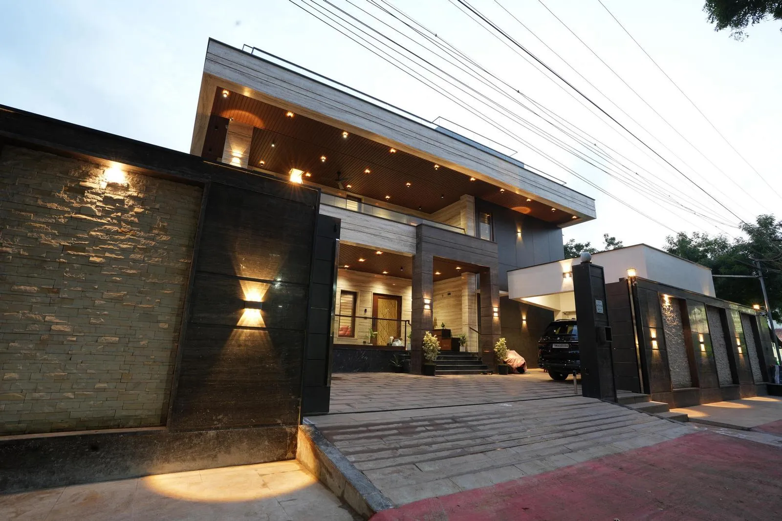 The residence is crafted entirely in marble, with sleek walls, flooring, and countertops creating a seamless, luxurious aesthetic.