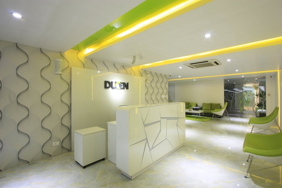 Linear LED lighting in green and yellow accentuates architectural lines and ceiling depths.