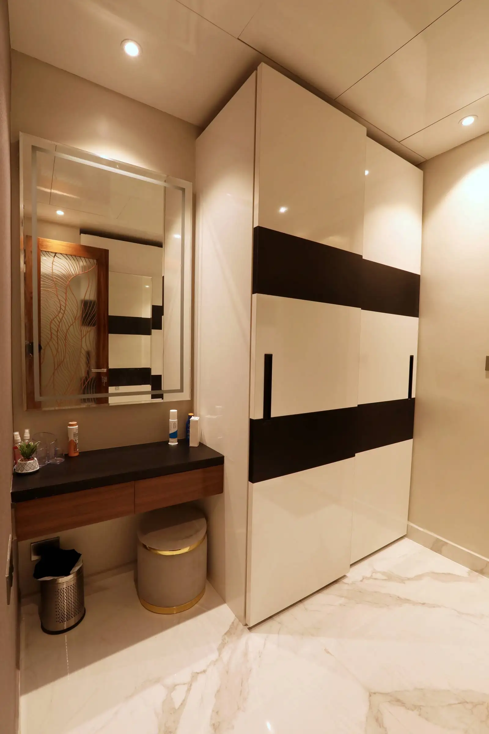 Sleek materials, smart storage, and minimalist design combine for a luxurious, functional, and elegant space.
