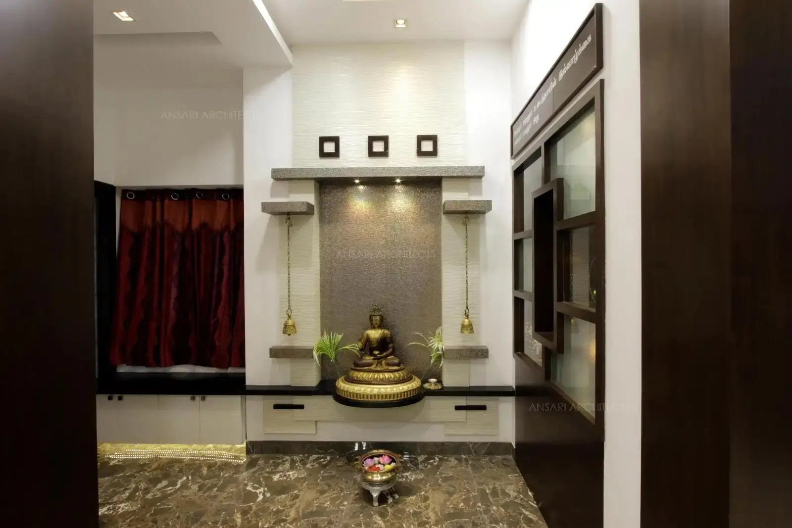 The backlit panels create an exquisite ambience another subtle background texture is provided, the ceiling provides a oozing character with recessed lights.