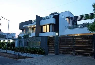 a house with a fence and a gate