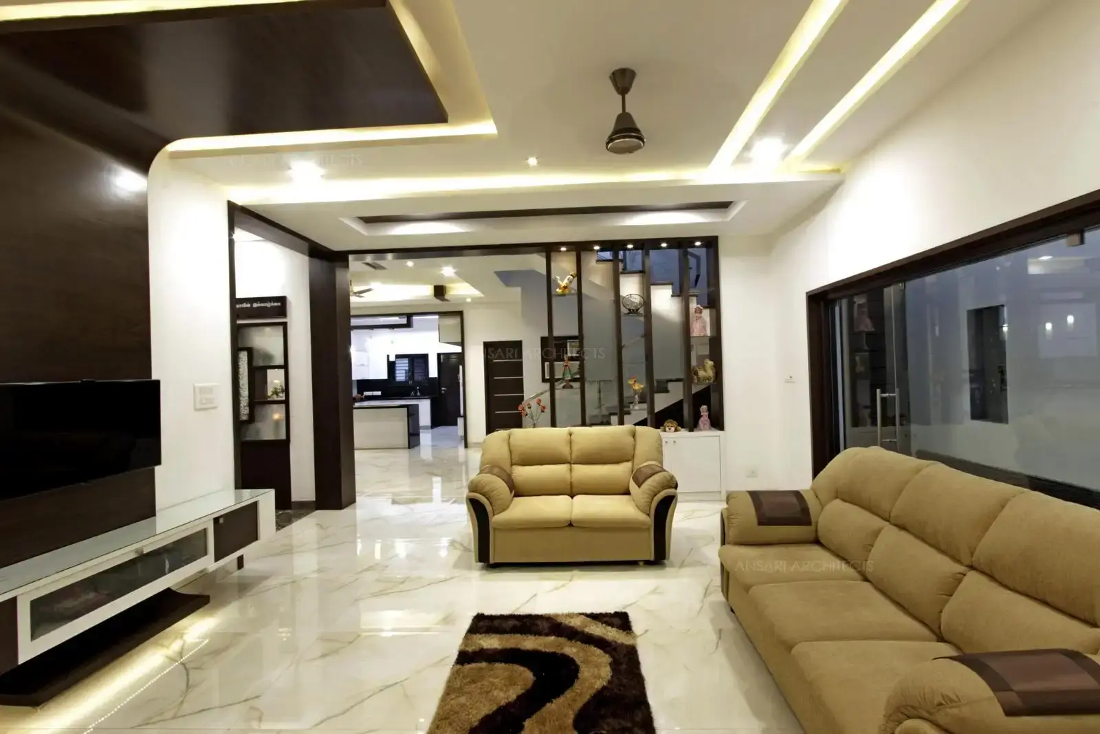 Marble flooring balances the affinity between thw walls, chosen pieces of artifacts with ample lighting ensures a perfect decor.
