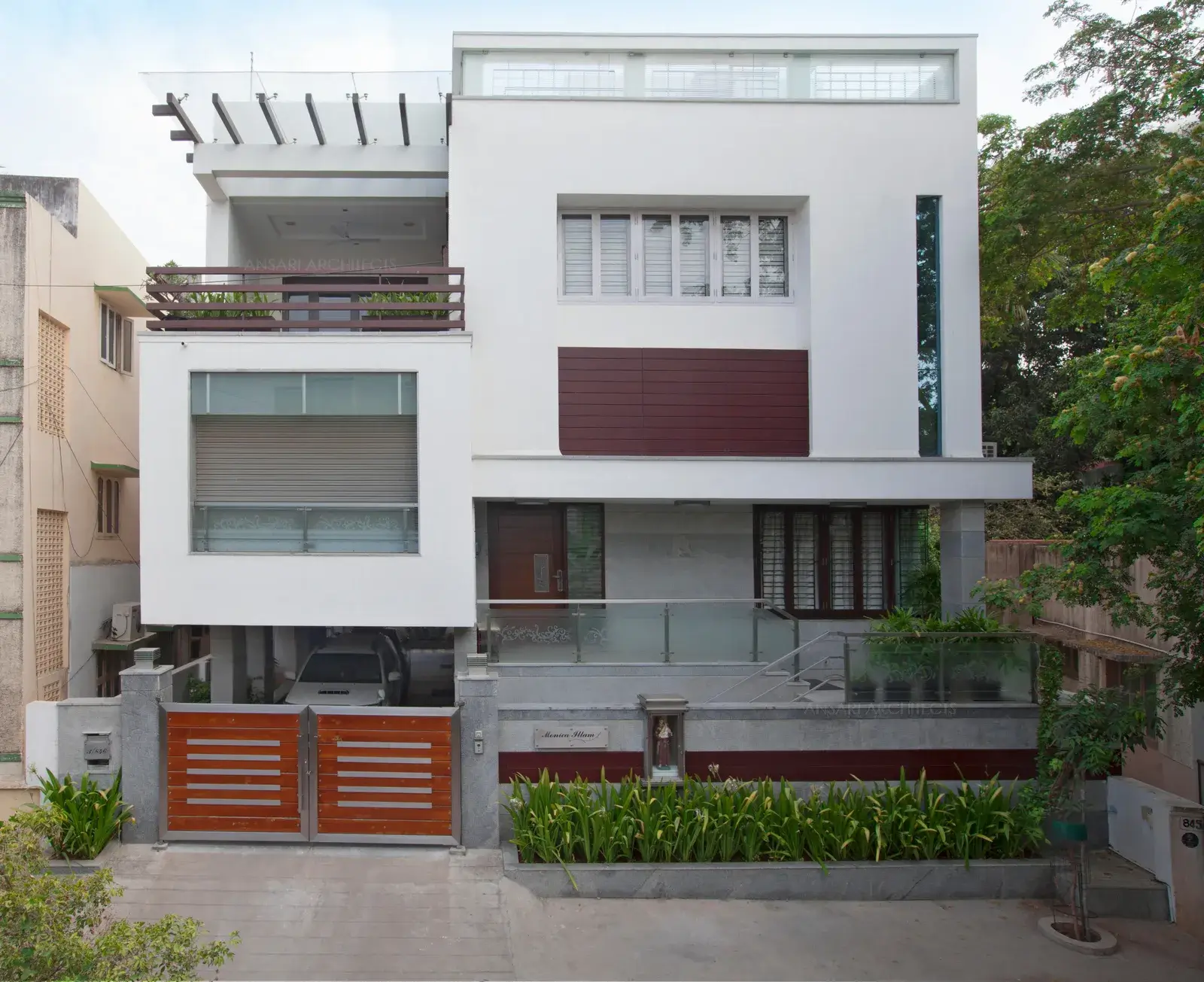 Photo of the House front which is facing North, thus receiving good lighting without harshness of the Sun. 'The Box Design' helps in avoiding the fury of Western Sun.