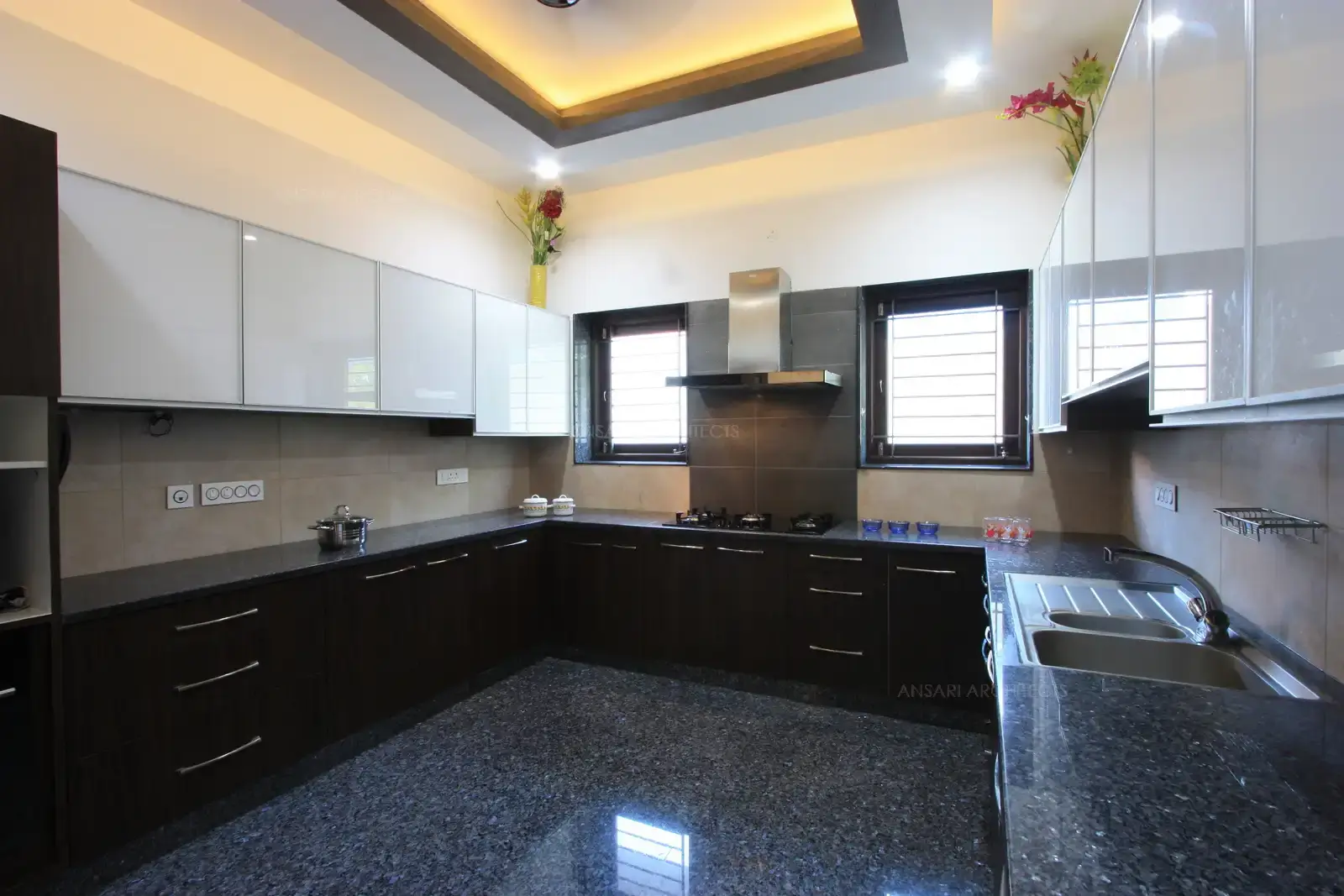 Kitchen in the south east of the building looks bright and clean with the use of simple colour scheme.