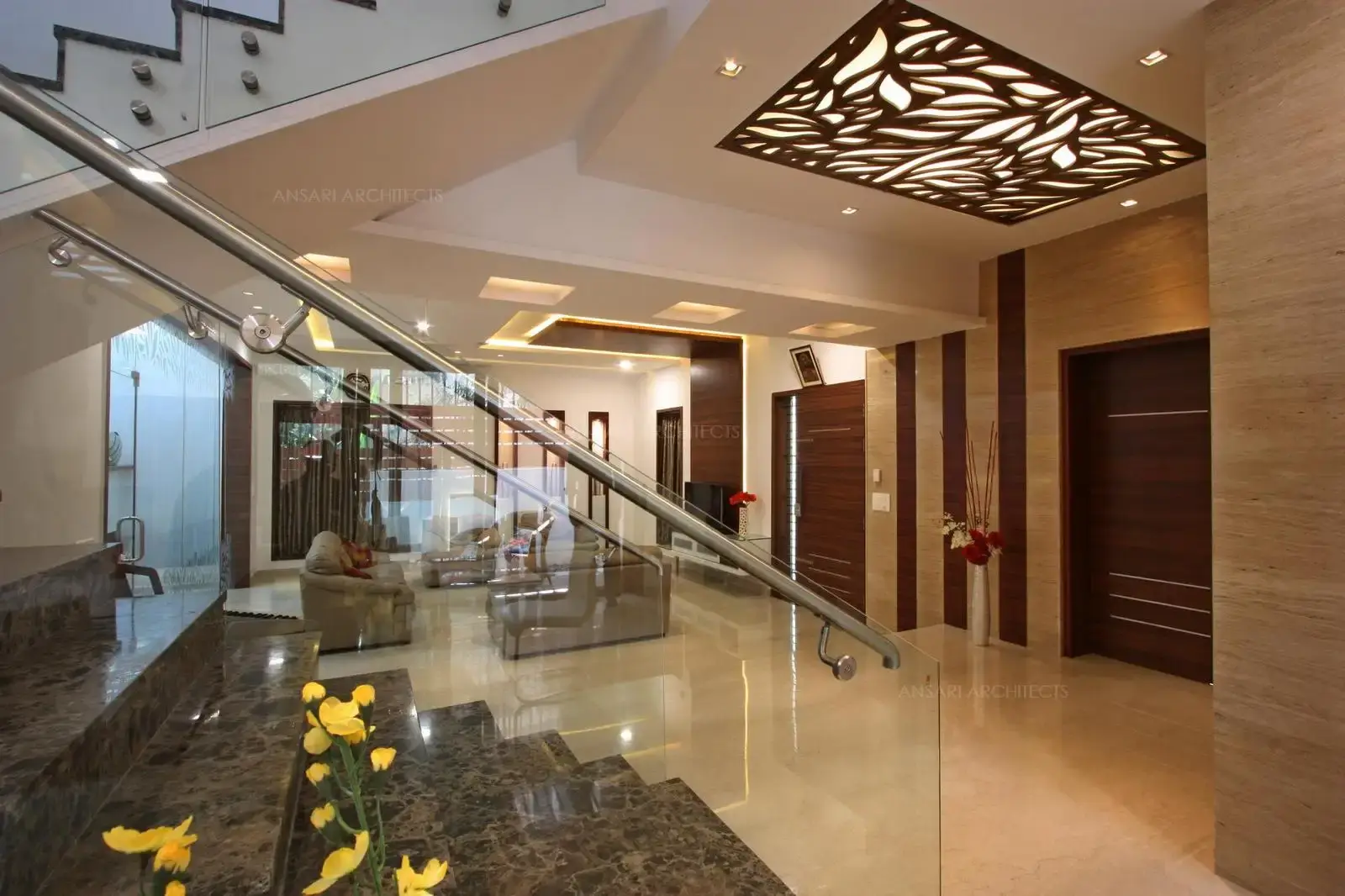The veneer has embedded natural patterns which offer more organic and high end look, the veneer touch acentuates the space. In this space the veneer cladding on walls from the floor level to the ceiling end creates a elaborated look.