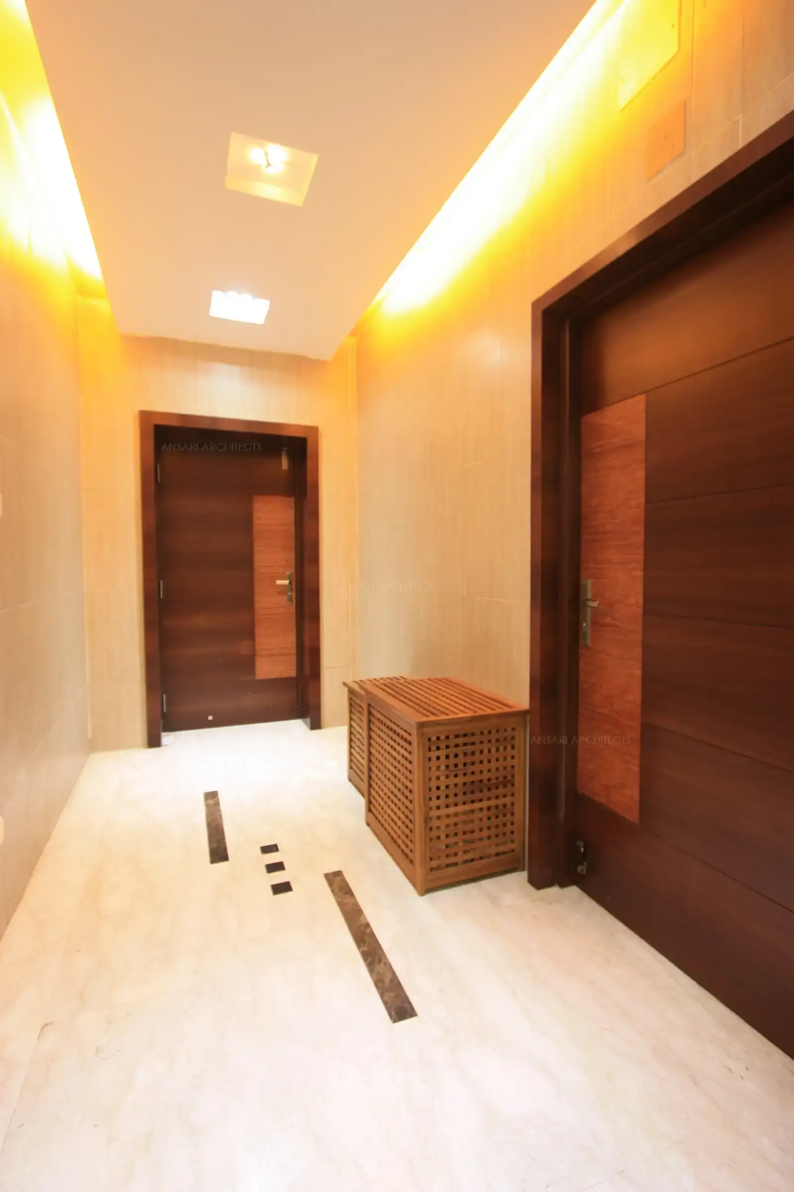 Italian Botticino marble floor used in the corridor and enhances the lighting and gives beautiful luxury appeal