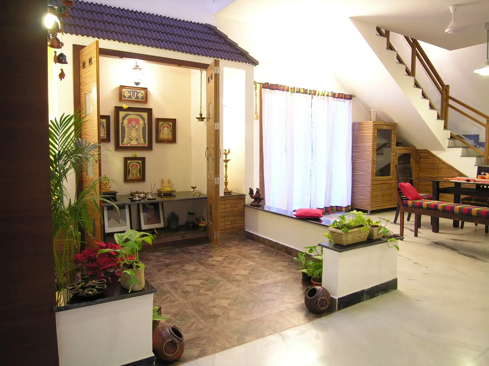Puja room has been planned in the courtyard which is seen from the first floor also.