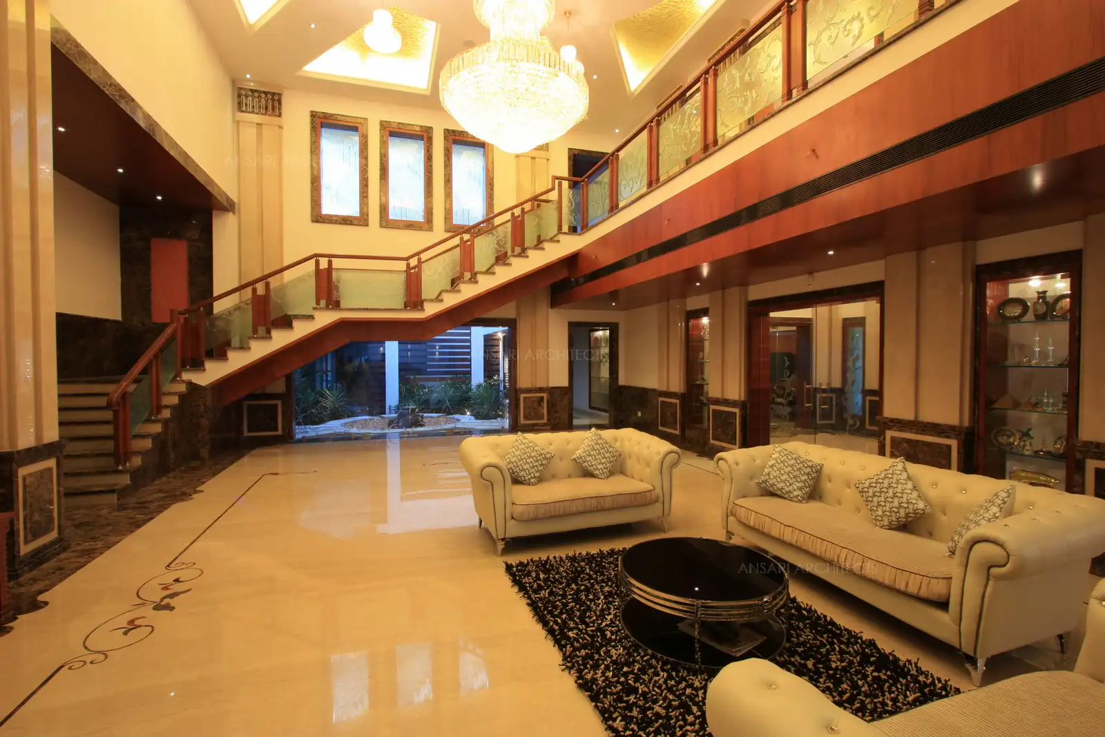 Plush leather sofas and other accesories sourced from Kuwait give a royal feel to the interiors.