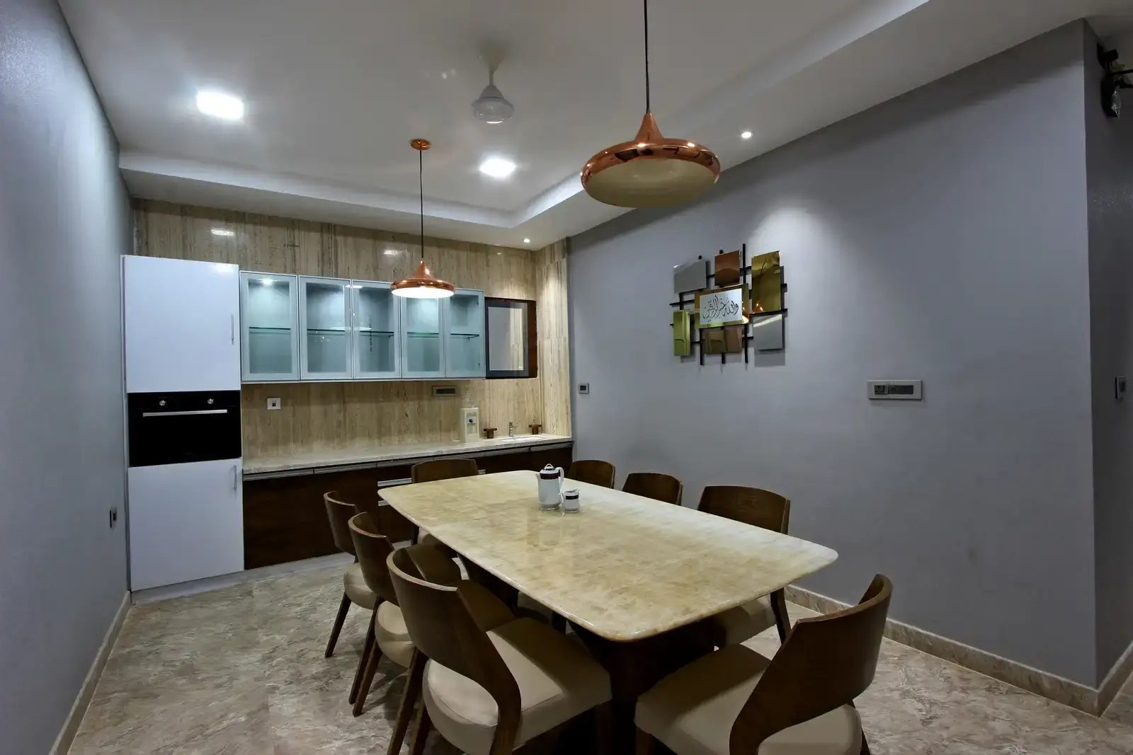 The montage of frames composed in the walls for decor where the antique style element is created. Pendant lights are eclectic decor elements here.