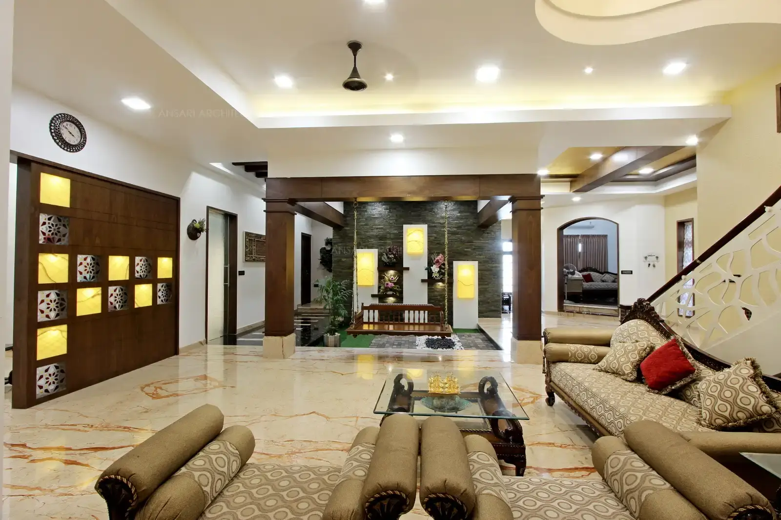 The entire space is a potpourri of patterns and textures. The white walls grab the limelight providing visual stimuation .