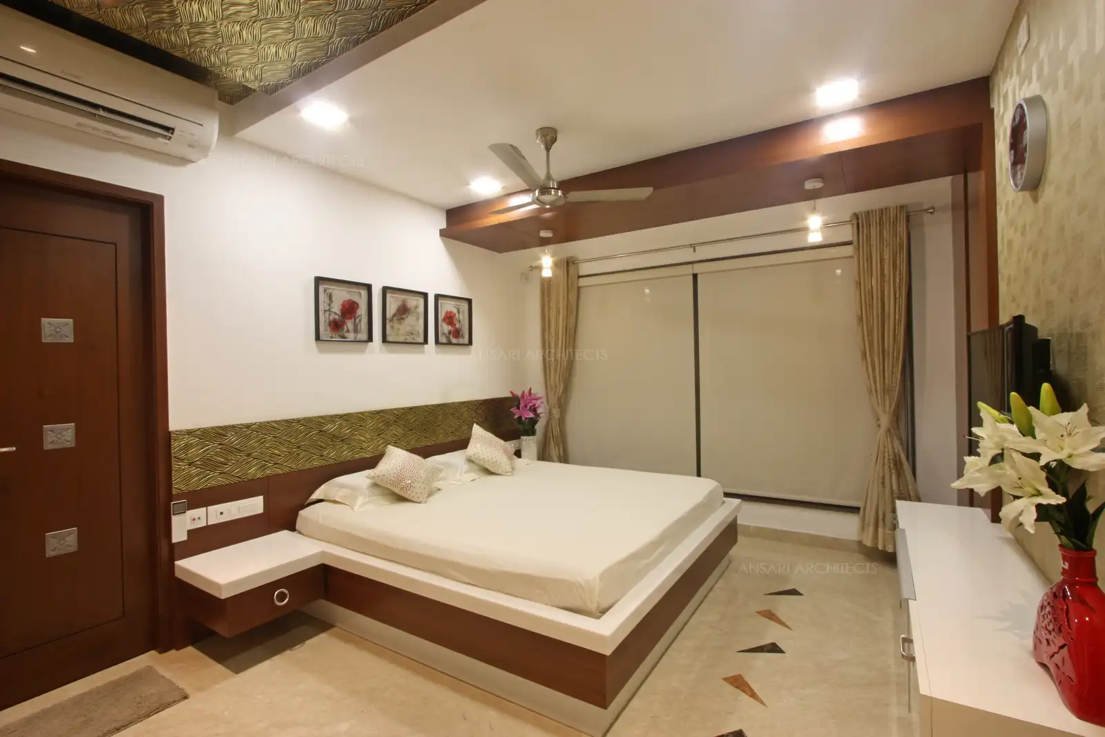 The textures remain to co-ordinate well with the white walls,the decor element paneling provides a canopy like aesthetic for the space gives a whimsical vibe
