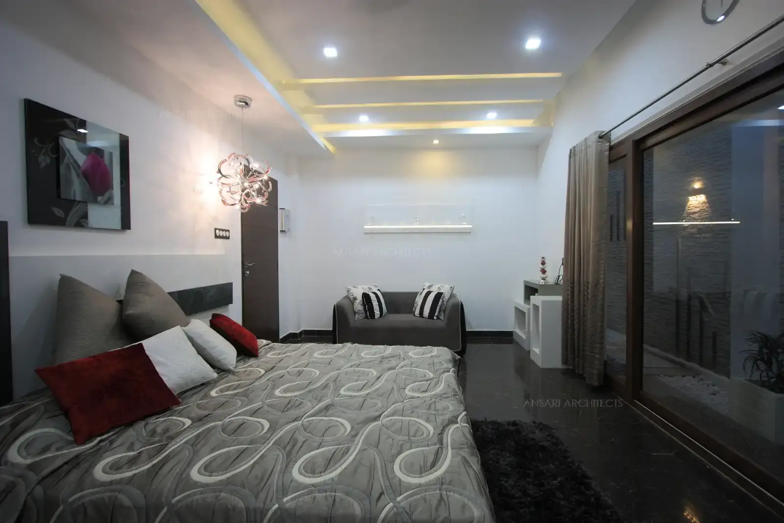 The master bedroom has elegant and minimal furnitures.