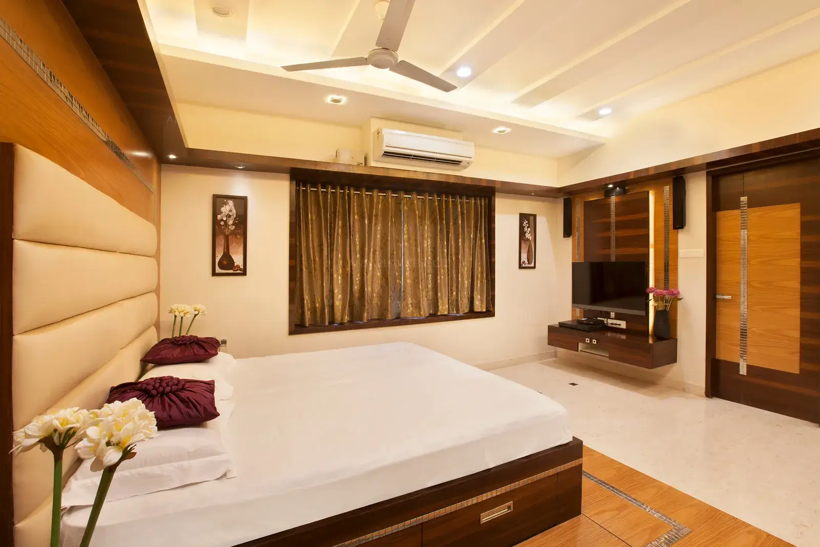 Master bedroom finished with warm colours with silver highlights for a rich look.