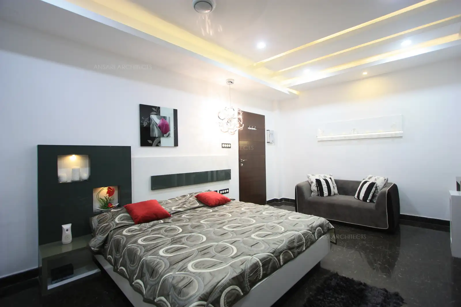 The master bedroom has a large window facing the courtyard.