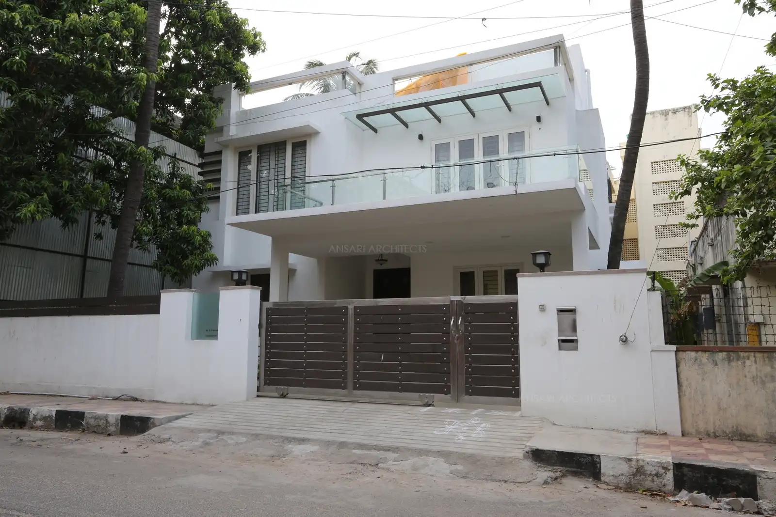 Exterior: Plain white finish exterior with wooden strips give a contemporary look.