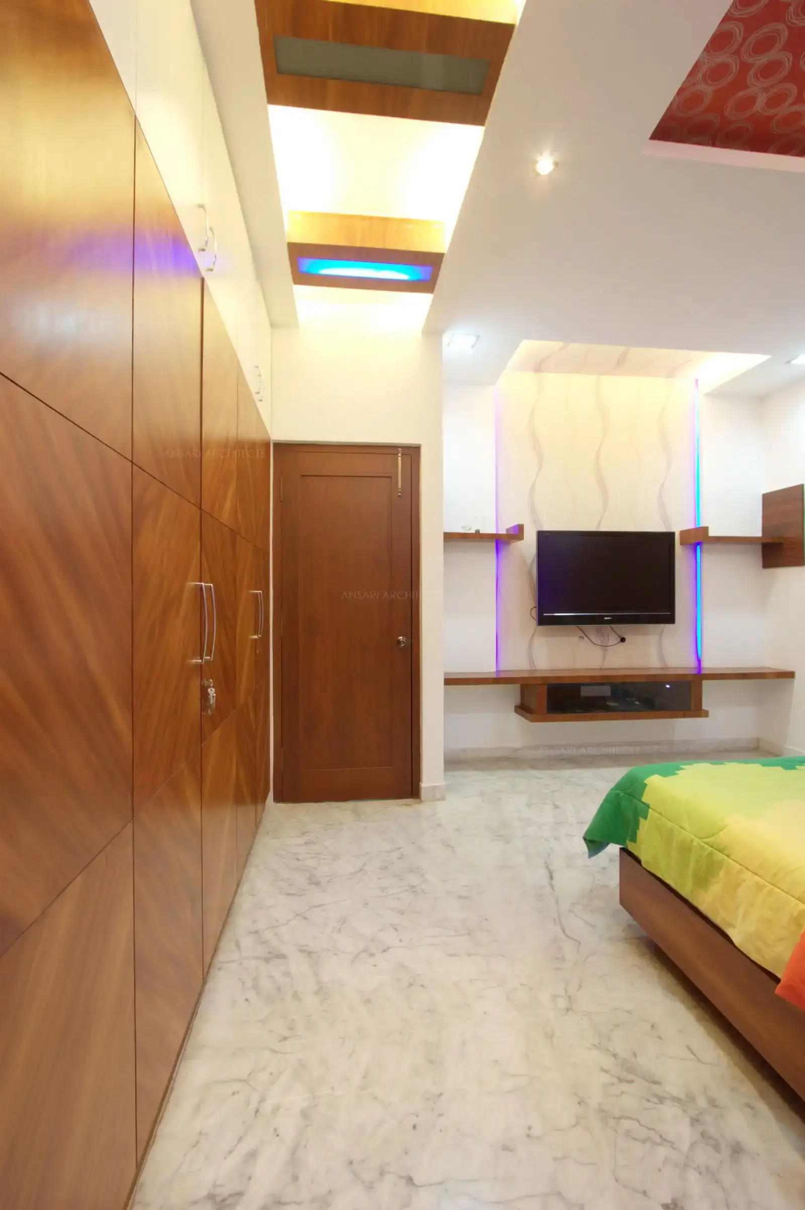 View of TV unit in bedroom-2 which is perfectly placed in the reccesed area formed in the room.