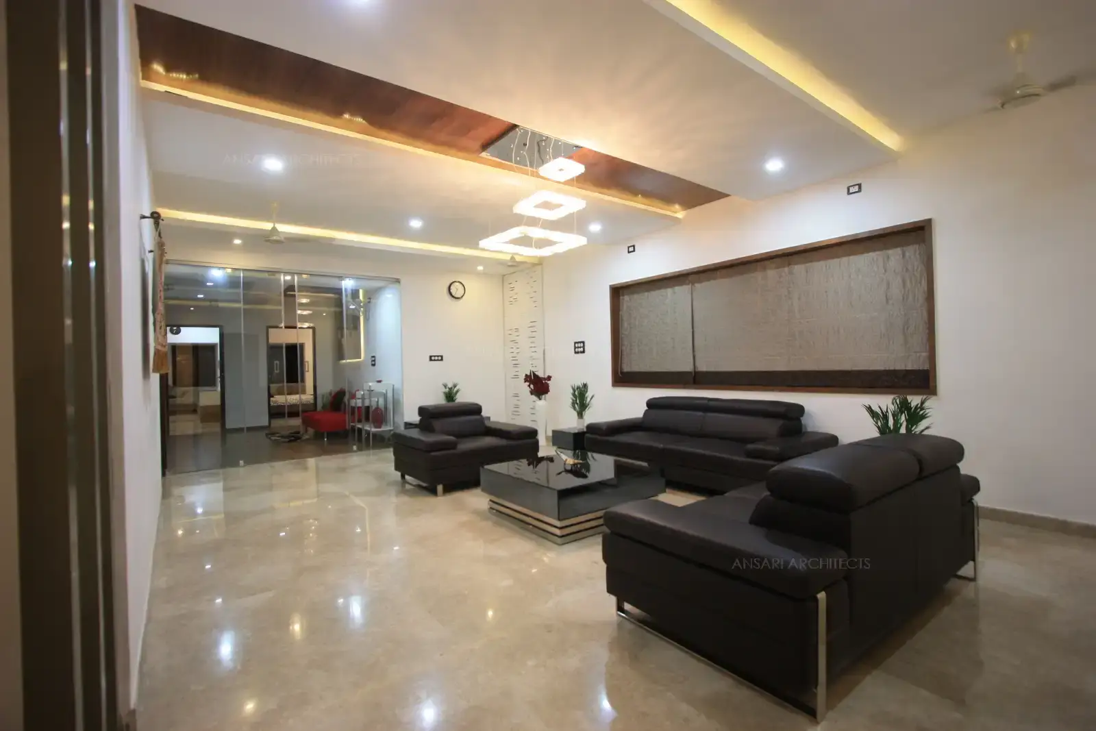 The family room in the first floor has well selected furnitures and decorative lights which goes well with the overall decor of the house..18