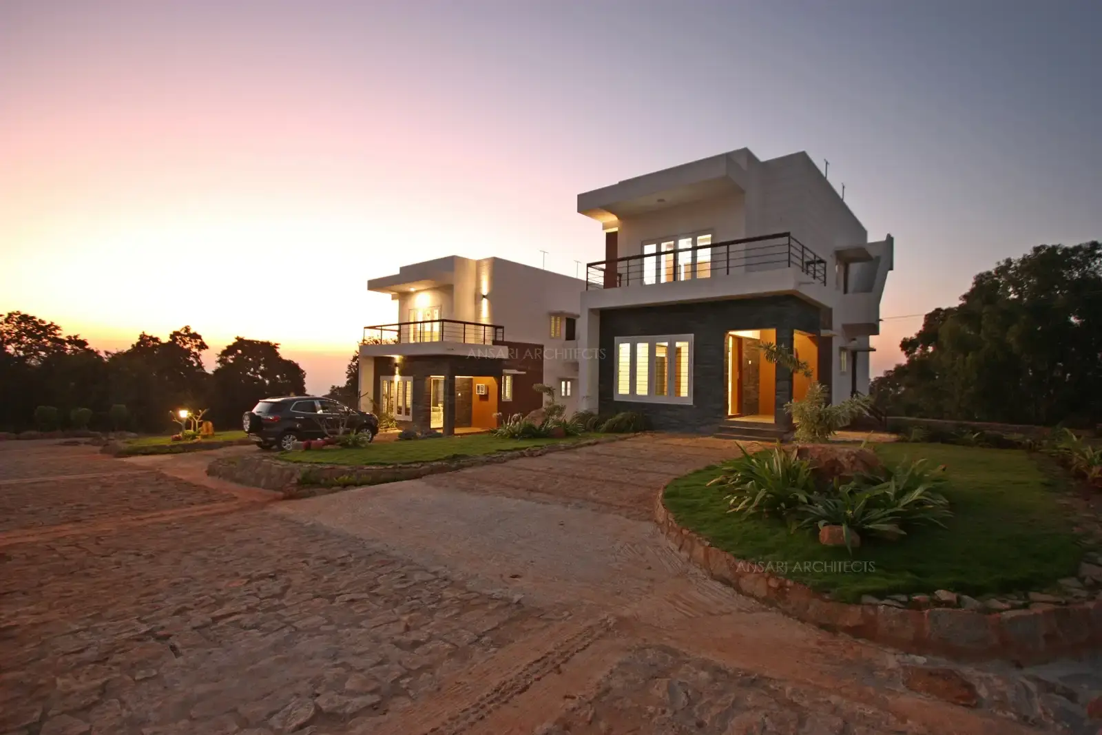 Subtle outdoor lighting enhances safety and ambiance, while the villa layout balances privacy with open communal spaces.