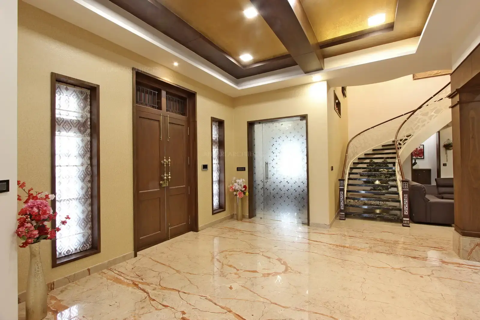 The foyer area is a spacious , neat space with extending coutyard