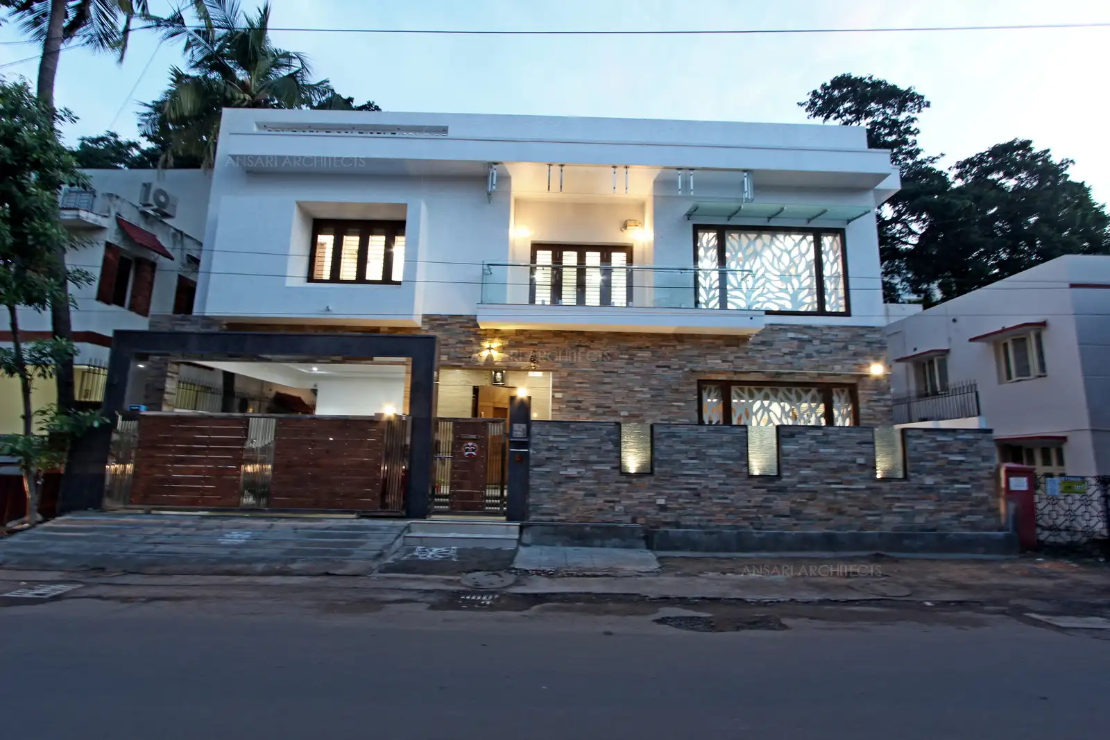 Large balconies and terrace create a connection with the exterior. Design elements on the exterior create visually pleasing effect on the exterior. The compound wall is designed as the contemporary style, with mild steel gates.