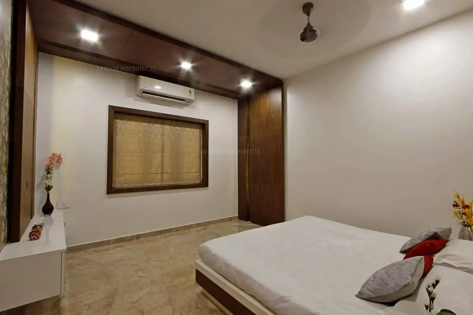 LED strip light inlays in the veneer and articulating the cladding provides a warm glow. It remains as a main feature of interest in the living room.