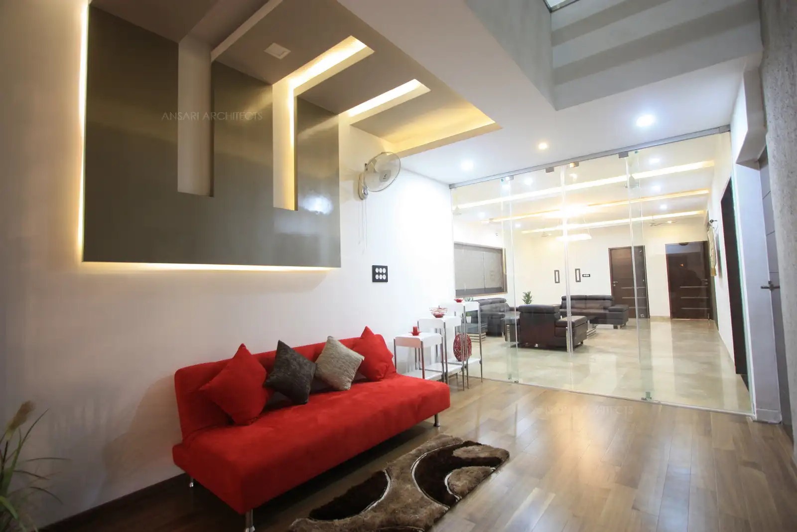 The staircase in the first floor leads to bright drawing room which opens up in the family room.