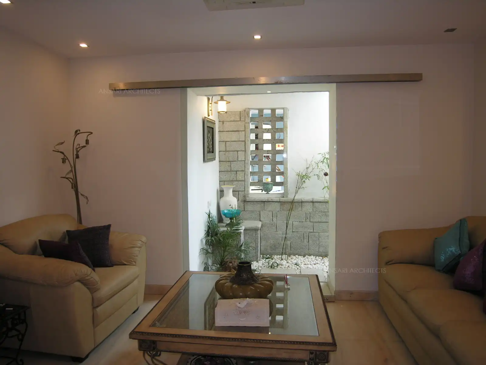 Courtyard from the dining room extends to the family area.