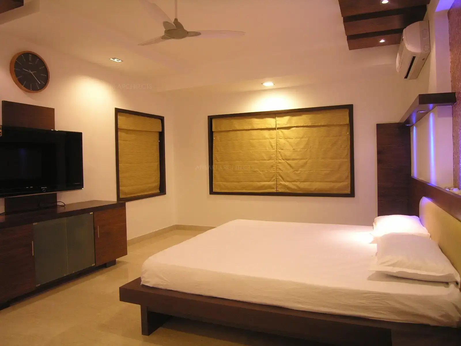 All the windows are treated with Roman blinds in box window with wooden panelling all around.