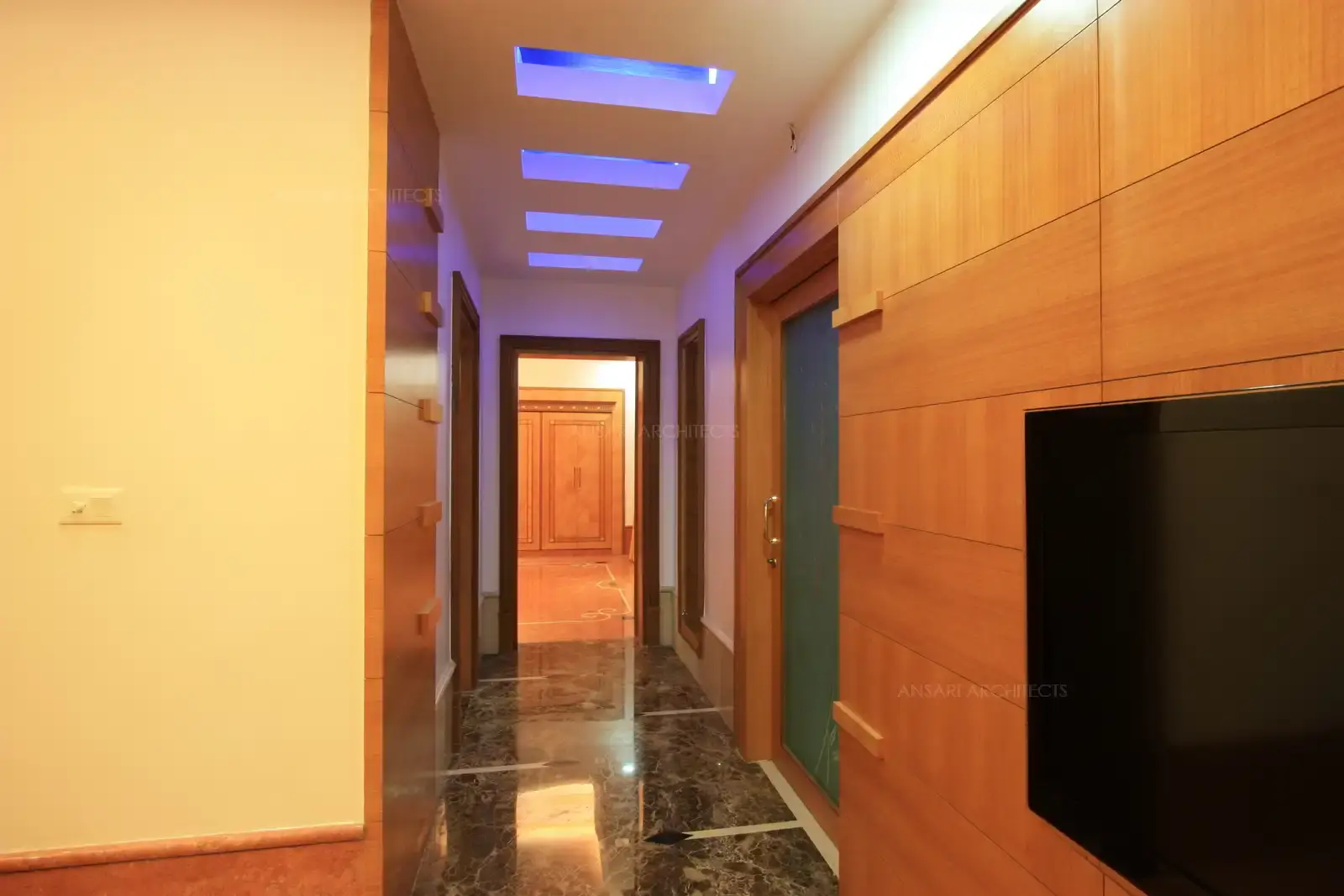 A passage from the lounge area leads to the spacious master bedroom.