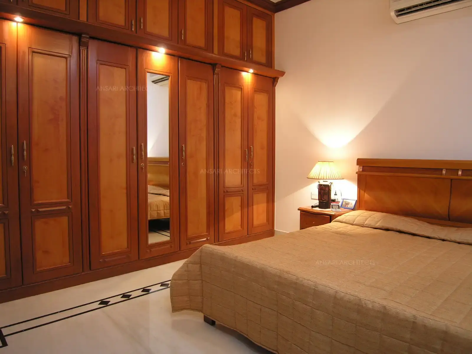 The master bedroom with the beautiful wooden wardrobe.
