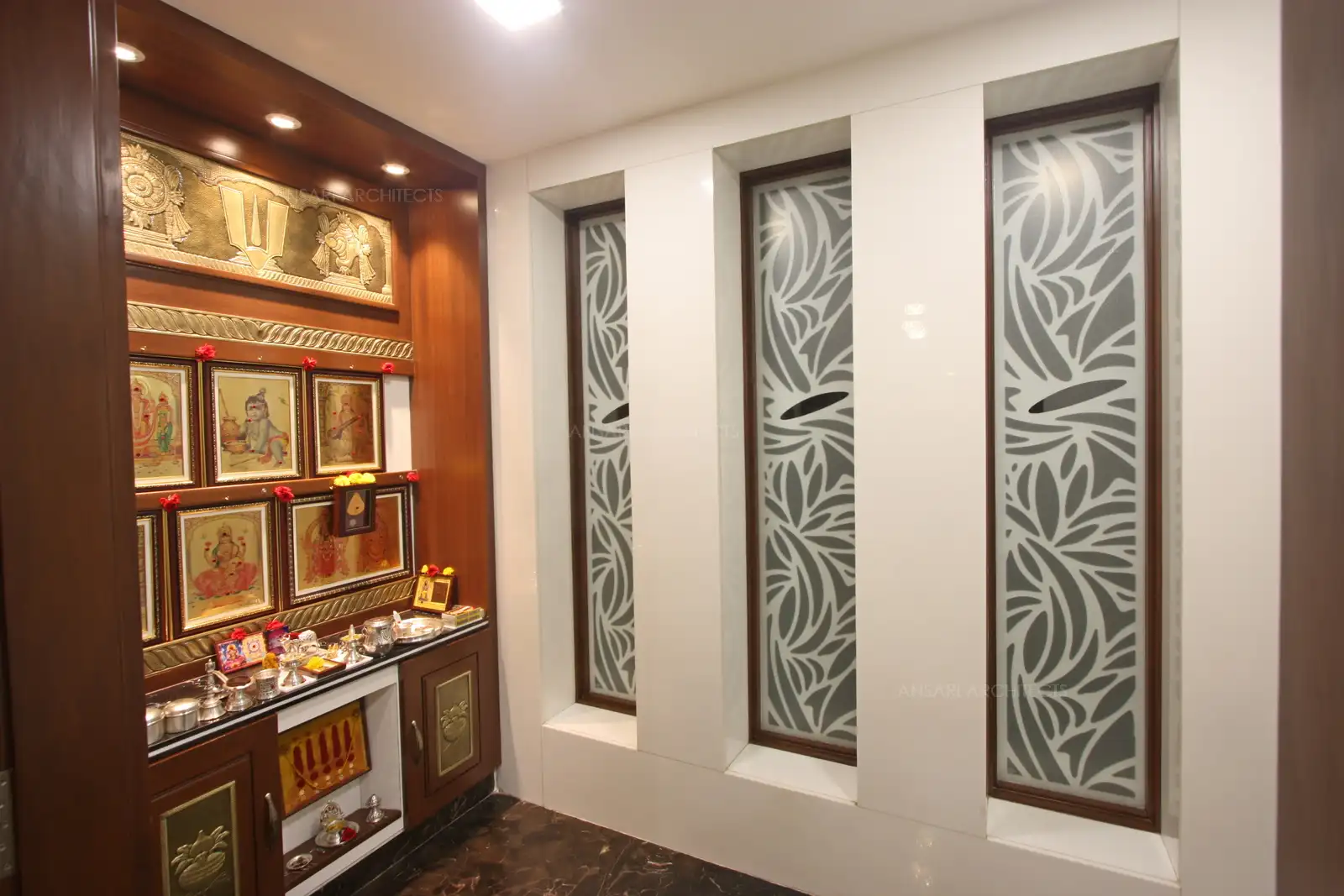 The panelling behind the shrine is created with veneer panels erected like a niche with recessed lights that gives an impression of depth.