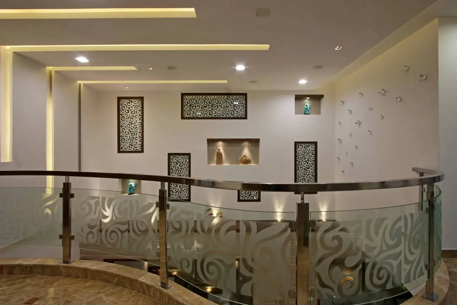 The cove lightings and wall decorations highlight the space.