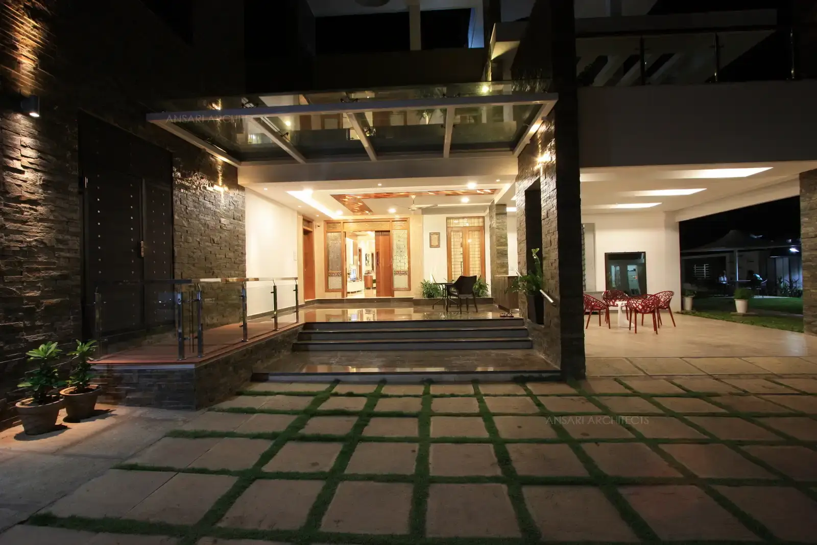 View of the main entrance showing the large veranda,car porch and sit out area.