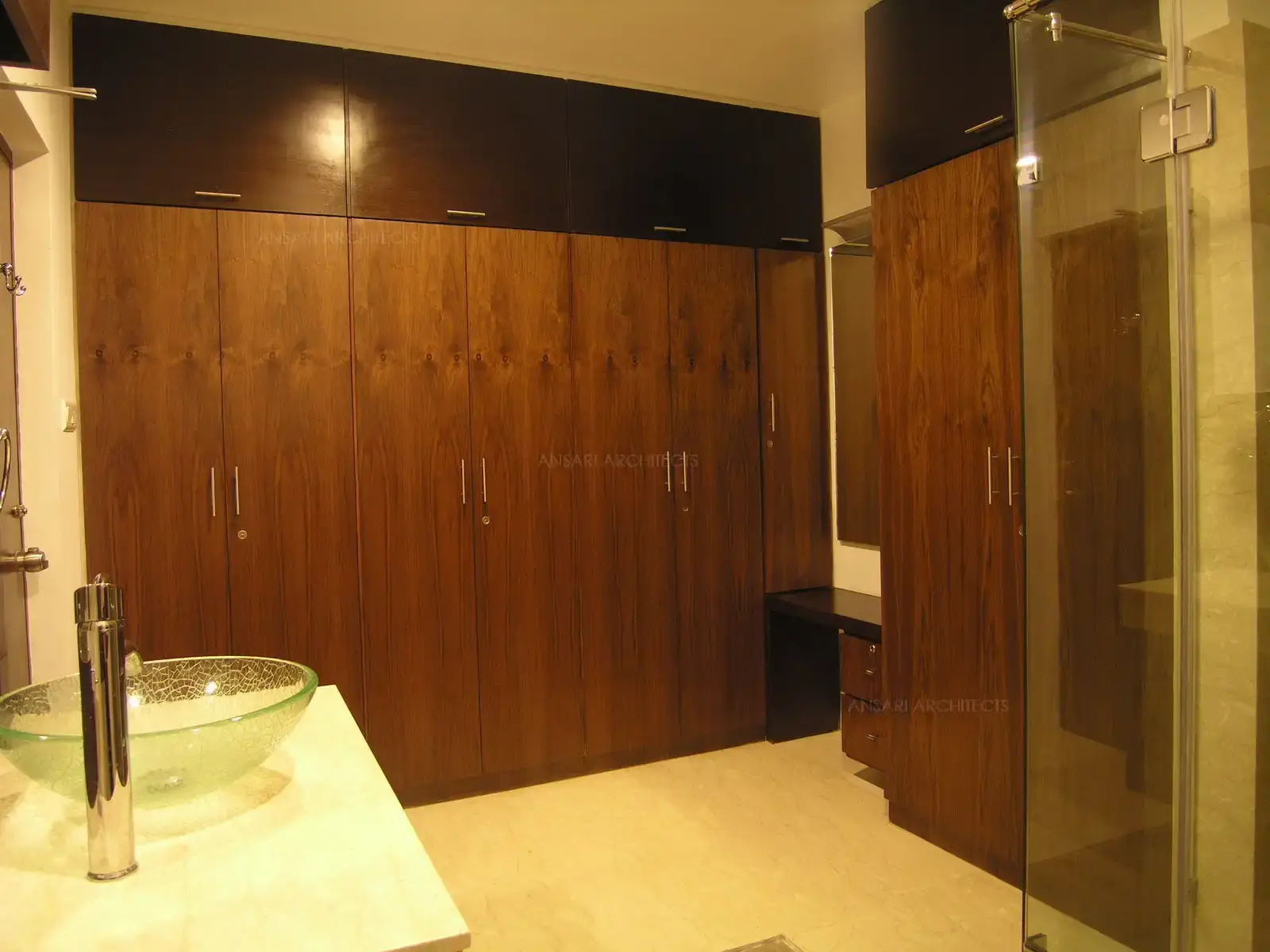 View of dressing area in the master bedroom from the toilet which has been combined together.