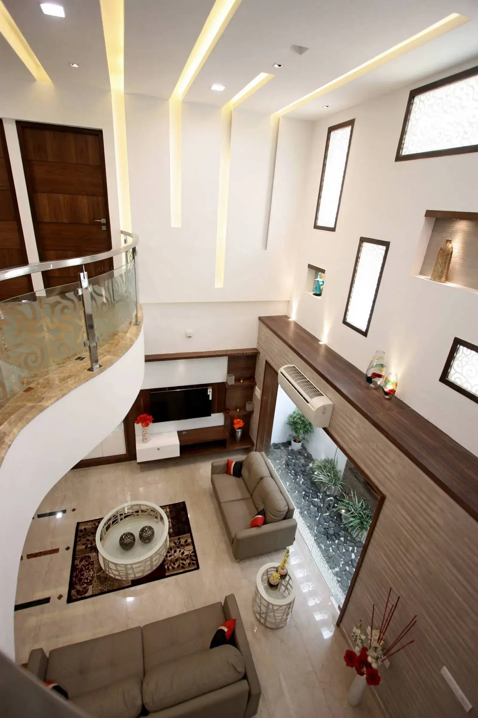 The fixed glasses are assymmetrically arranged and to provide natural light.