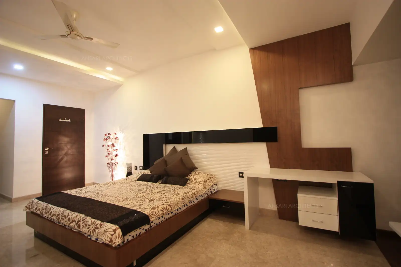 Angular lines and different textures in the decor give an interesting look to this bedroom-4.