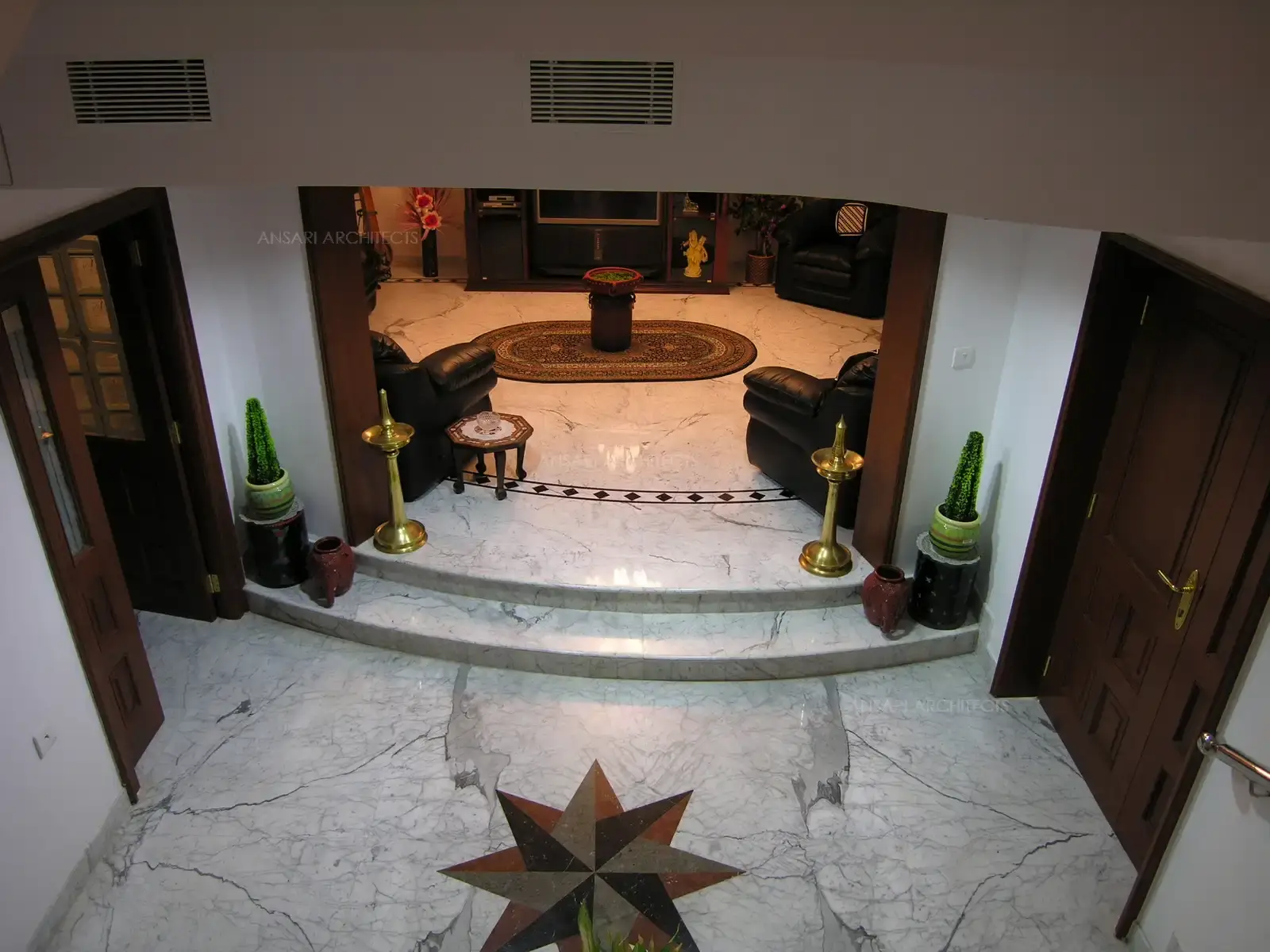 The entrance lobby as seen from top shows the inlay of marble work in the Italian marble.