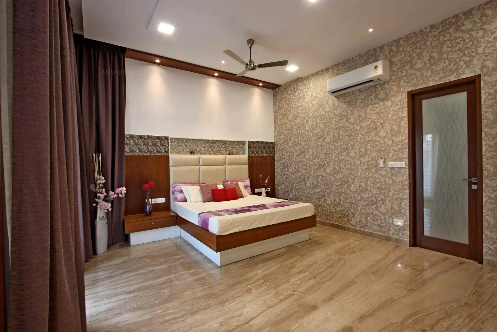 The wooden panelling is complemented by the wall paper walls with floral patterns balances with solid hued surface to provide visual interest, the entire decor calms the space.