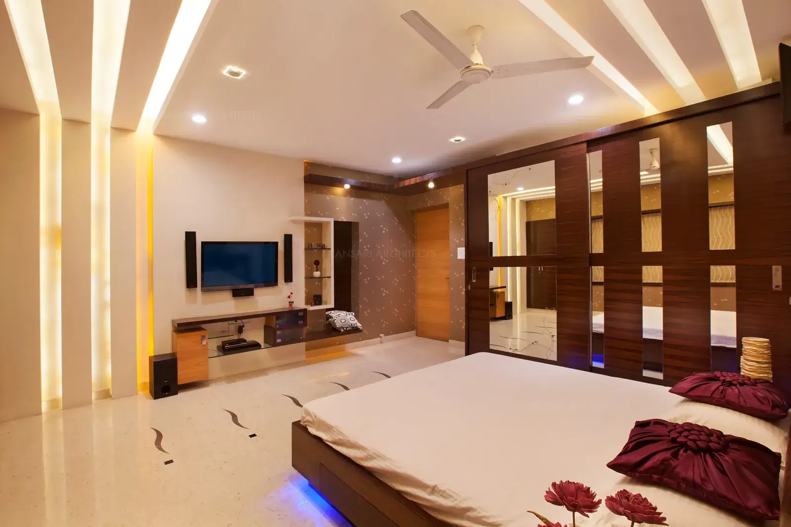 Concealed lights from the false ceiling connects to wall giving a bright and spacious feel in the daughter's room.