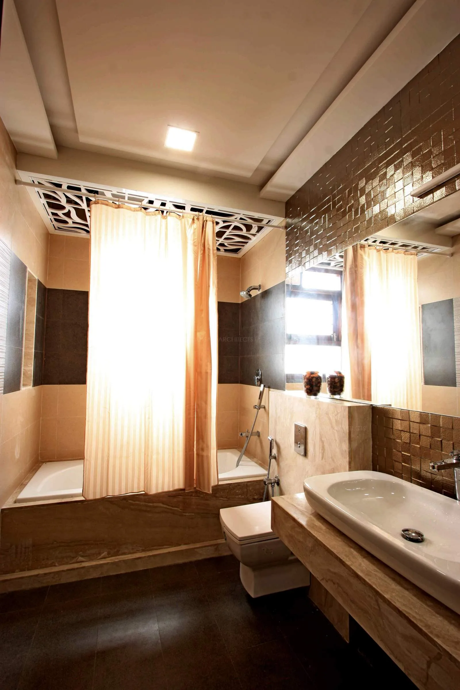 Sheer curtains blind the lighting on the shower space, wooden texture creates warmth. elegant decorative panels and ceiling decor add a contemporary effect.