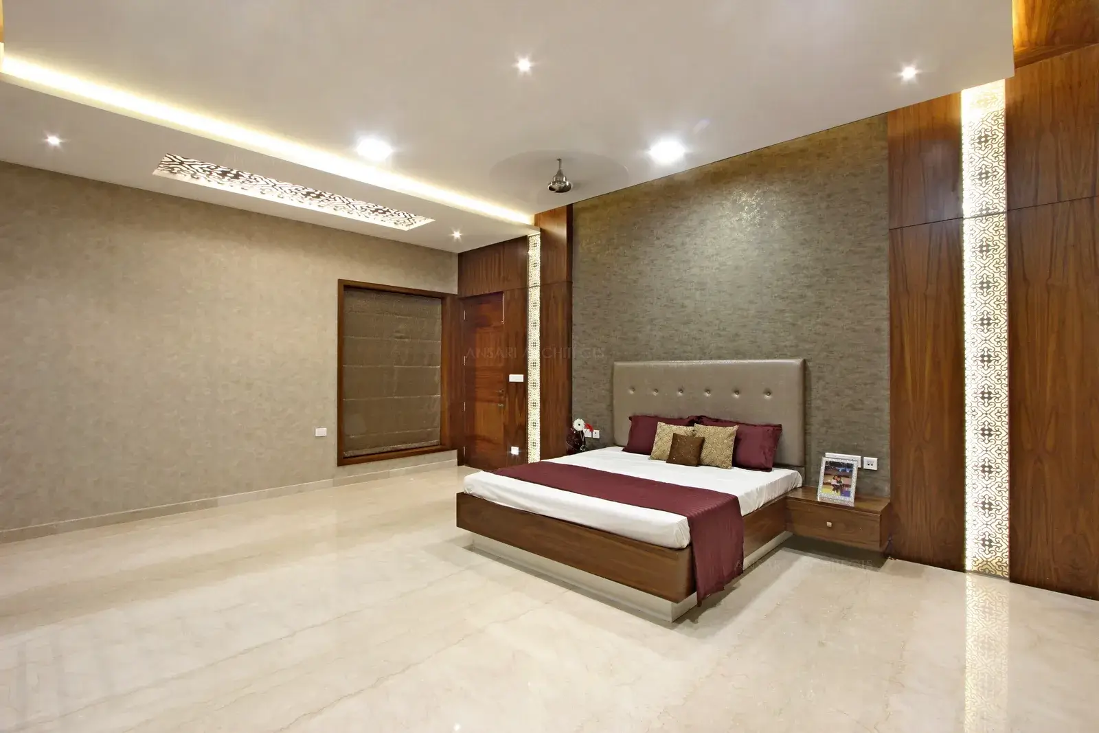 Rich colour and texture for an ethereal approach, layering of wood adds warmth. Soft bed with co-ordinated furnishings looks striking.