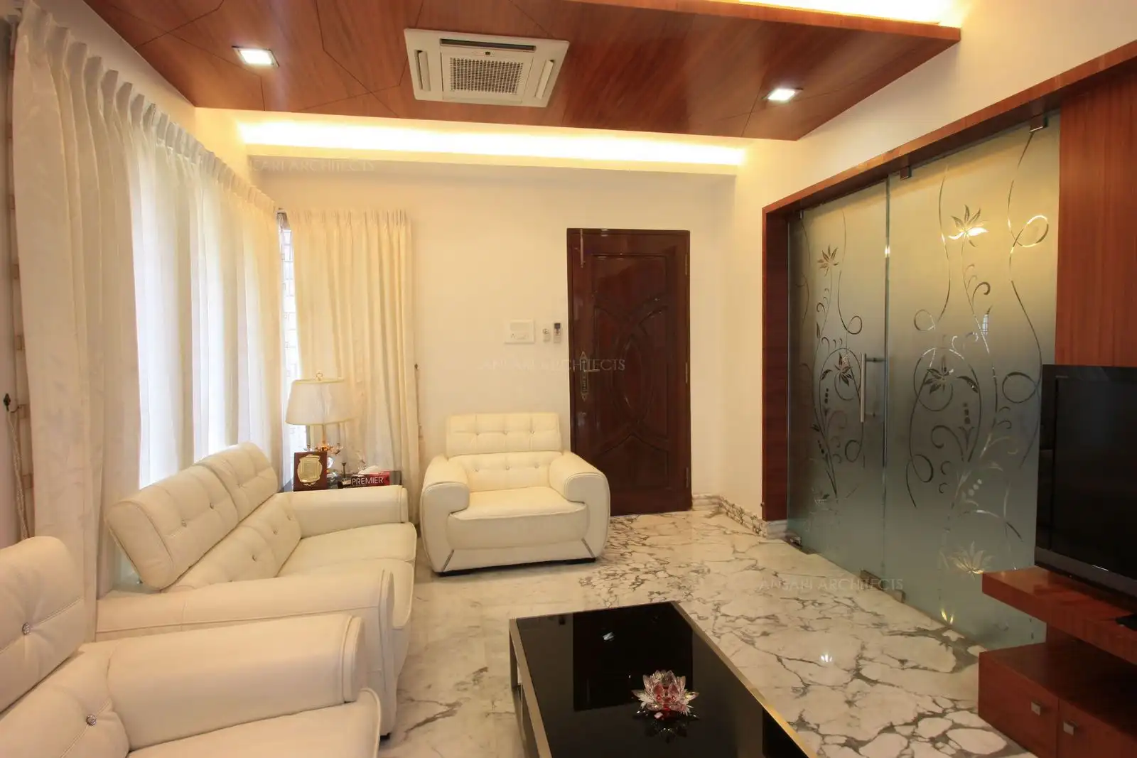 View of drawing room showing the entrance glass door.