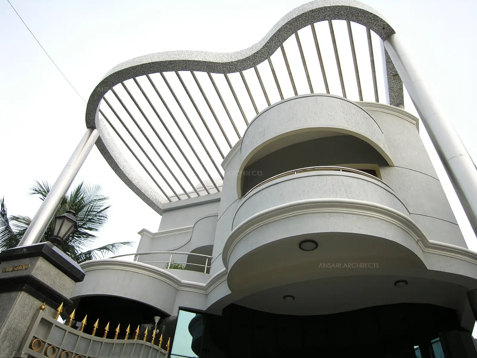 The Pergola which is at three floors height is finished with Stainless steel to prevent corrosion as the building is close to the seaside. Also, the tall pillars which are supporting the pergola are clad with stainless steel material, which are specially ordered and installed to prevent the corrosion.
