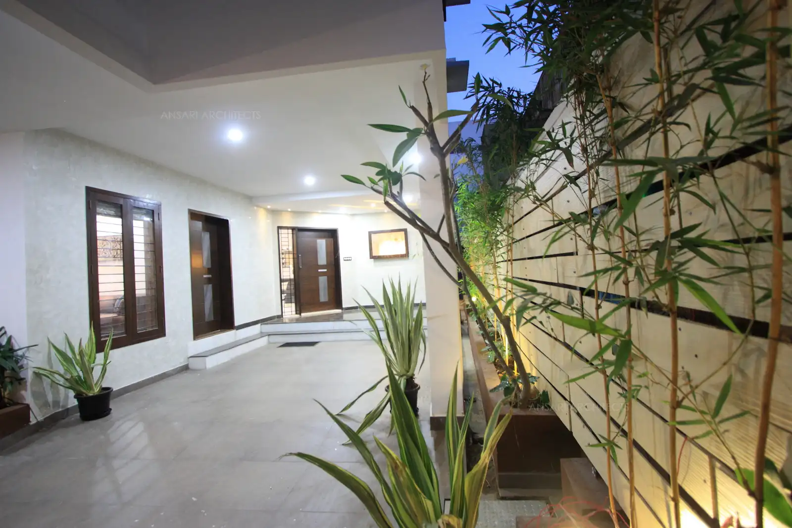 Car porch in the front leads to veranda and entrance.