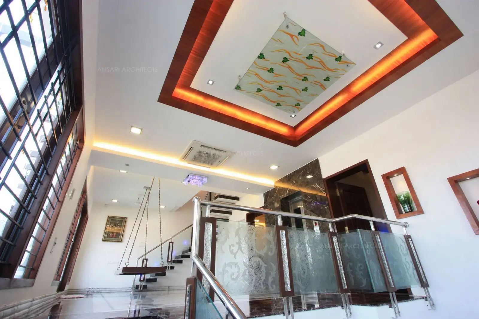 View of wooden and glass false ceiling in the second floor.