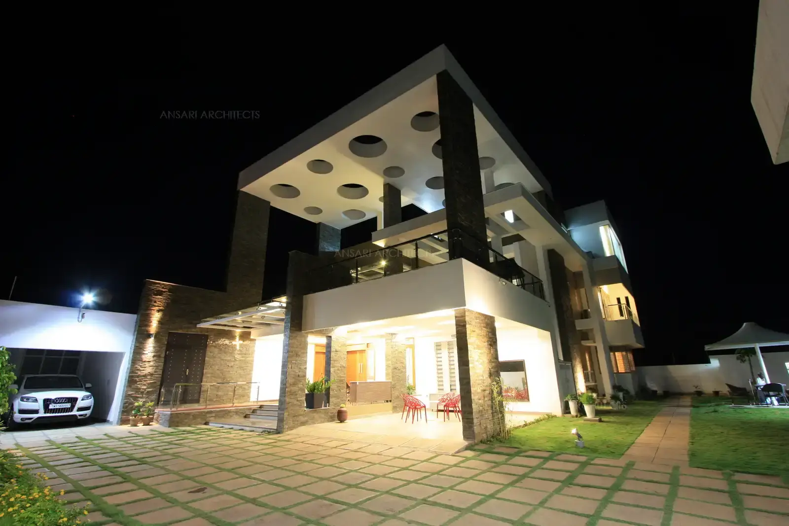 View of main entrance showing pergolas at different levels.