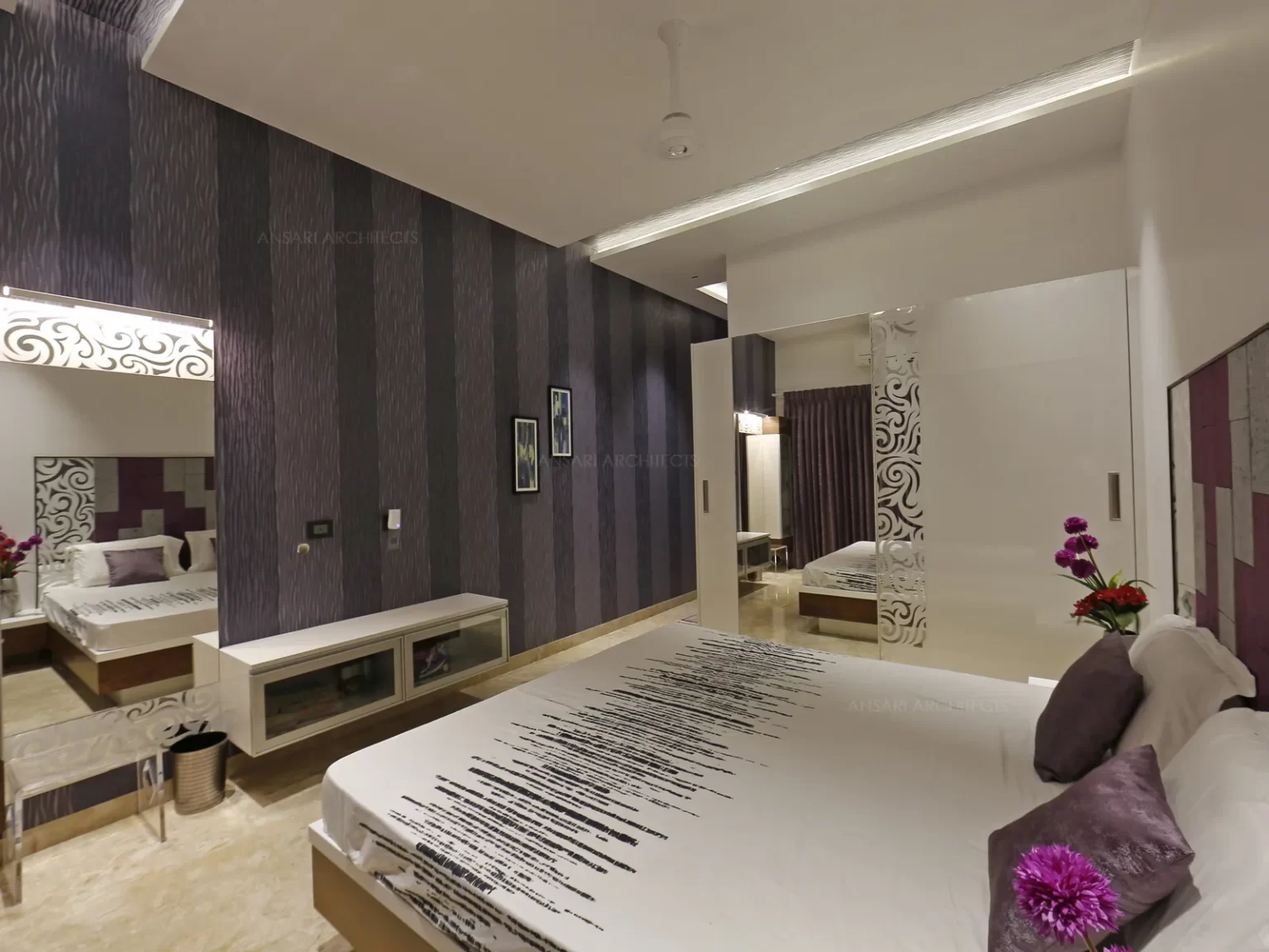 The tides of purple and pink is tranquil along with the entire wall with functional furniture usage to embrace boldness.
