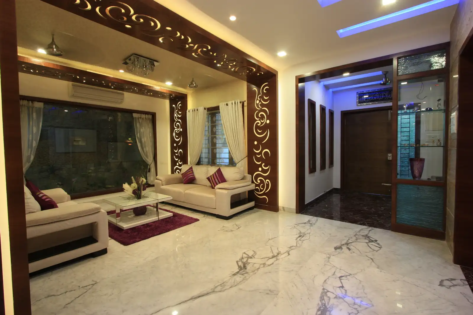 View of drawing room showing the entrance and the veranda with a display partition.