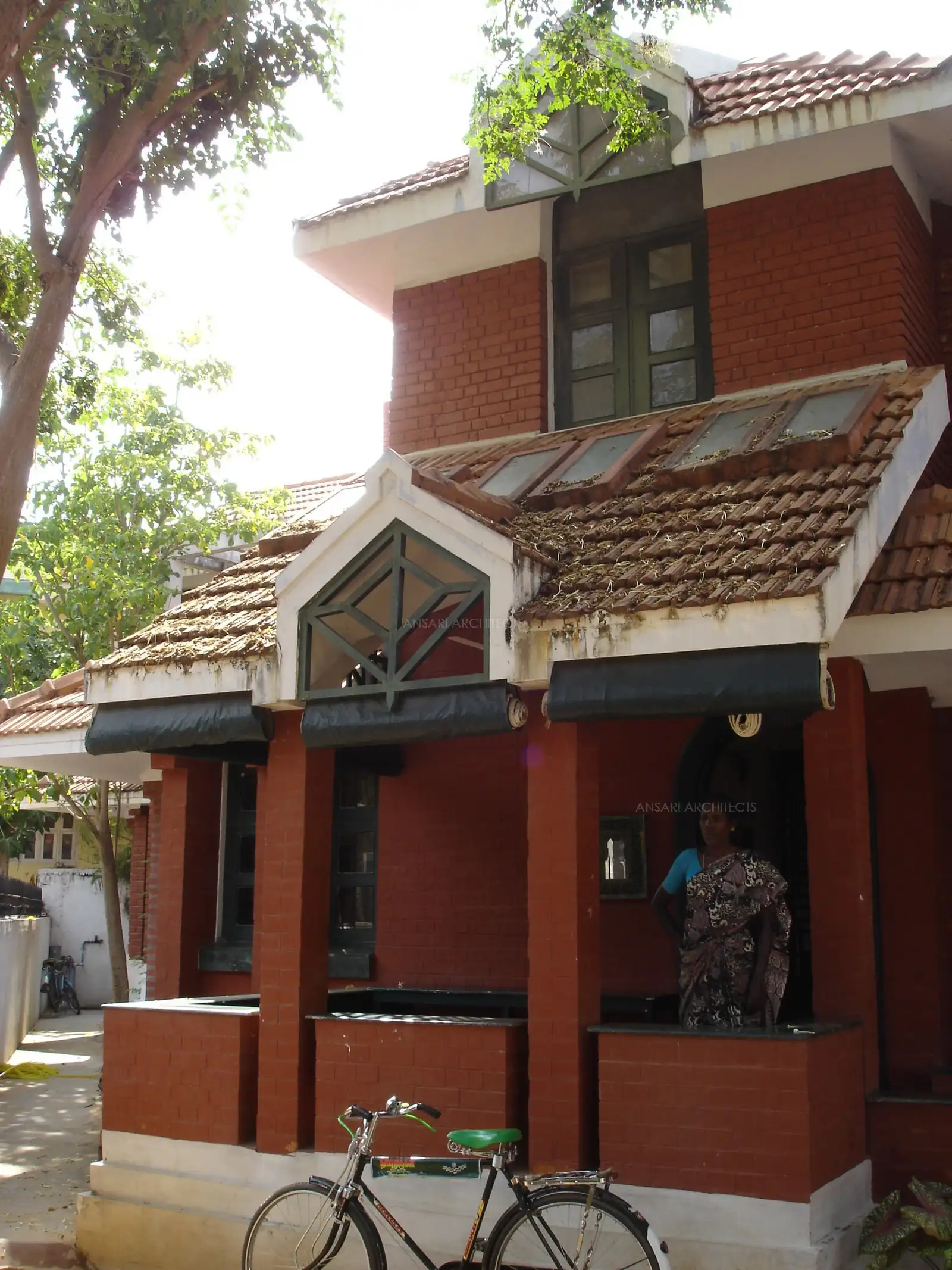 Exterior view showing slope roofs at different level.